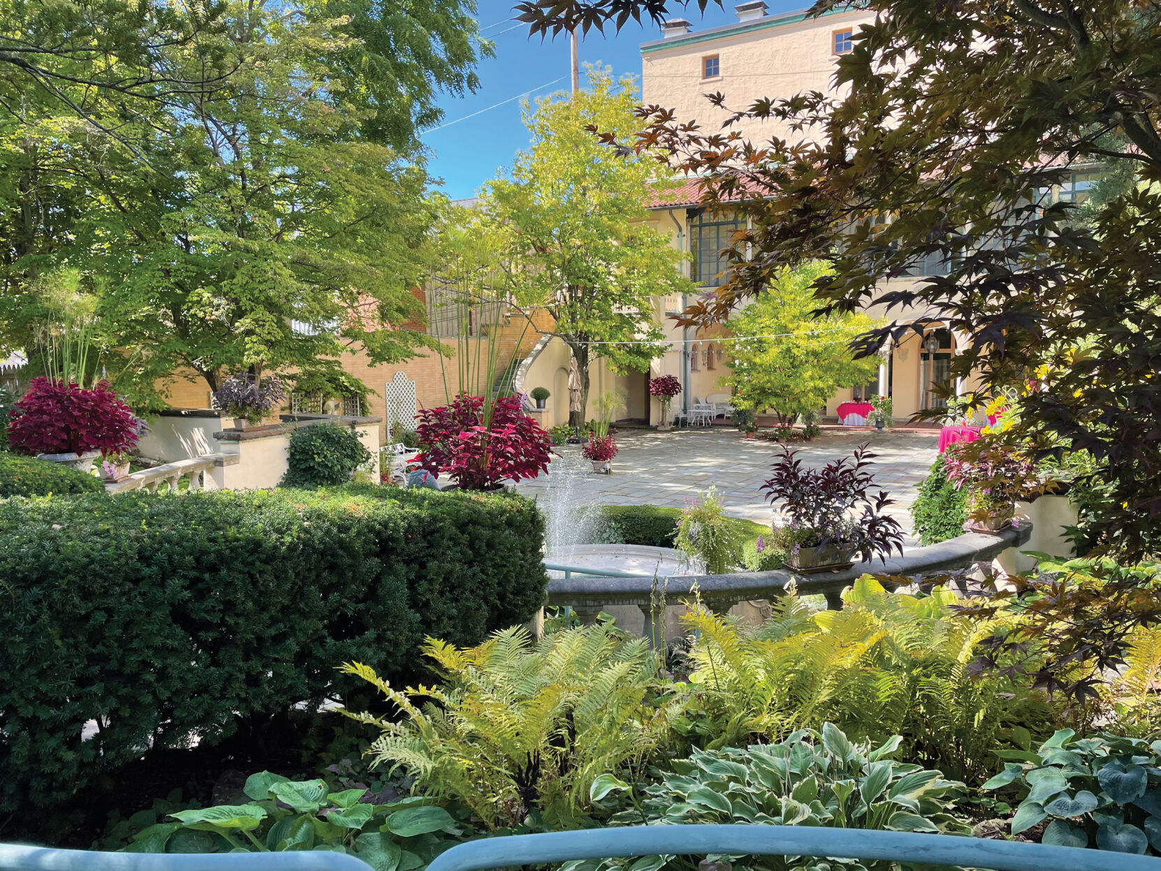 Twentieth Century Club courtyard, surrounded by plantings